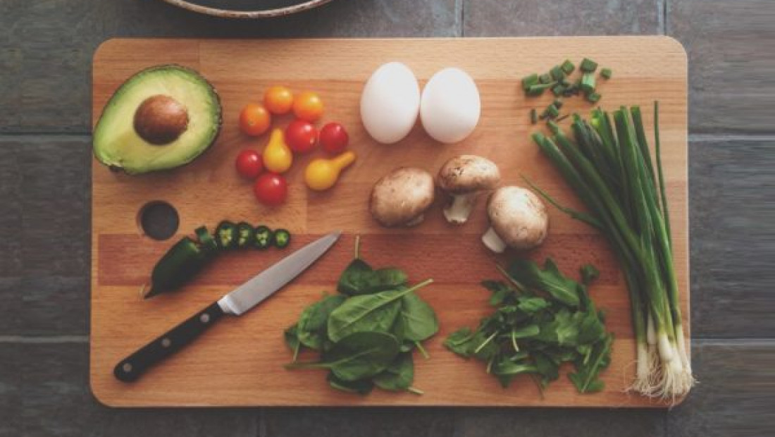 cutting board with sliced vegetables