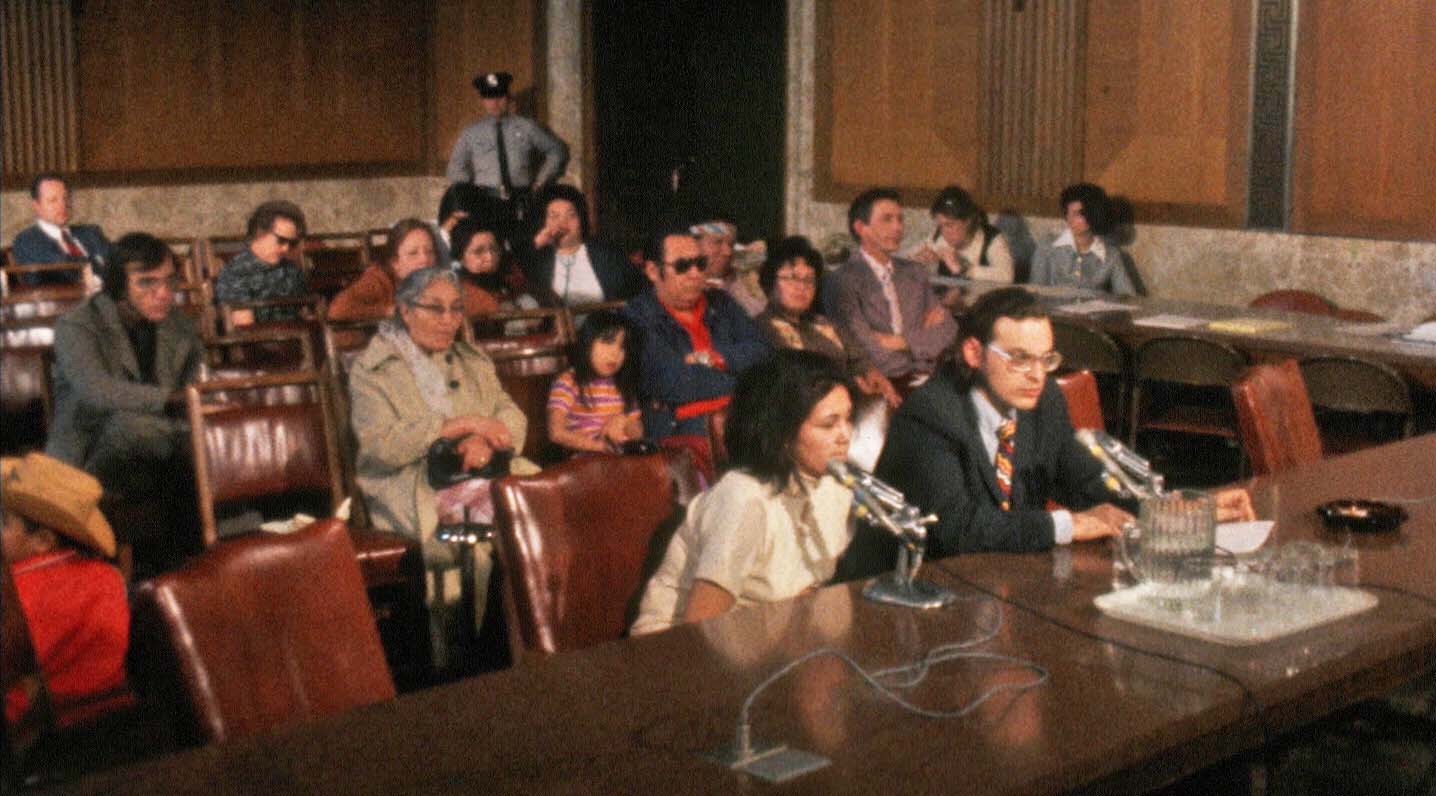 Court room with man and woman at table